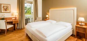 Postel nebo postele na pokoji v ubytování Villa Bavaria