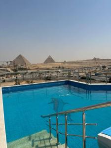 Bazén v ubytovaní Al Fouad Pyramids View Hotel alebo v jeho blízkosti