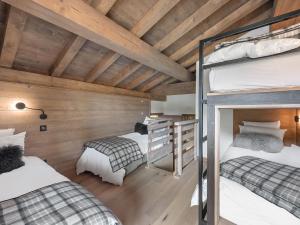 Posteľ alebo postele v izbe v ubytovaní Appartement spacieux avec accès bien-être, proche des pistes et du centre de Megève - FR-1-569-46