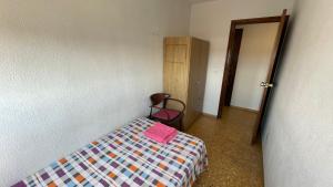 Postel nebo postele na pokoji v ubytování flat Holiday friend group or family near beach center blasco ibanez