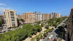 an aerial view of a city with tall buildings at flat Holiday friend group or family near beach center blasco ibanez in Valencia