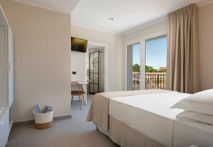 Katil atau katil-katil dalam bilik di MEM Lodge and Suite