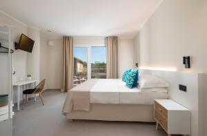 Katil atau katil-katil dalam bilik di MEM Lodge and Suite