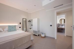 Katil atau katil-katil dalam bilik di MEM Lodge and Suite