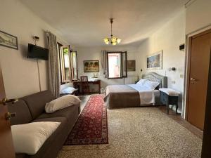 Postel nebo postele na pokoji v ubytování Venice Guest House