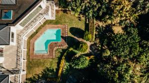 an aerial view of a yard with a swimming pool at House Ritze in Gonubie