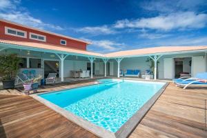 Piscina di Luxueuse Villa Katleya, vue mer o nelle vicinanze