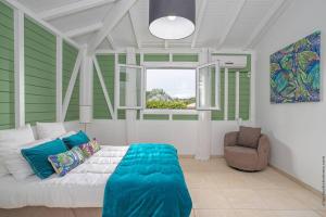 Letto o letti in una camera di Luxueuse Villa Katleya, vue mer