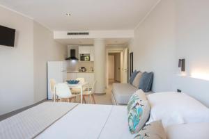 Katil atau katil-katil dalam bilik di MEM Lodge and Suite
