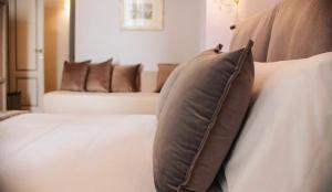 Posteľ alebo postele v izbe v ubytovaní B&B Dimora Sassetti 6