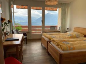 Postel nebo postele na pokoji v ubytování Rooms Haltenegg