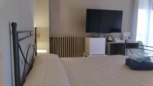 Letto o letti in una camera di Cconforthotels R&B Suite&Chic