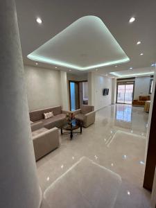 TV a/nebo společenská místnost v ubytování O' appartement Alhoceima