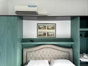 Postel nebo postele na pokoji v ubytování Venice Guest House