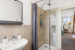 Koupelna v ubytování Maracoon - Suite Studios Krefeld Uerdingen I 20 Min zur Messe + 13 fotografií