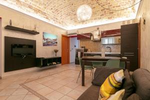 a living room with a couch and a table at IamartinoApartments in Termoli