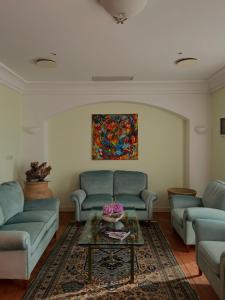 Posezení v ubytování Hotel La Lampara