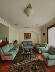 Posezení v ubytování Hotel La Lampara