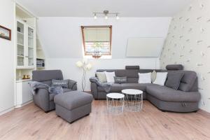 Ein Sitzbereich in der Unterkunft Ferienhaus Windspiel