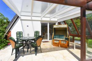 Ein Balkon oder eine Terrasse in der Unterkunft Ferienhaus Windspiel