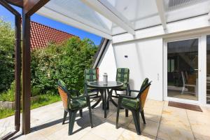 Ein Balkon oder eine Terrasse in der Unterkunft Ferienhaus Windspiel