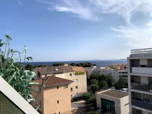 a view of some buildings in a city at Appartement Saint-Raphaël in Saint-Raphaël