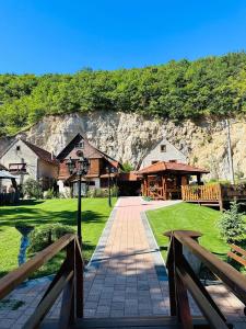 a resort with a mountain in the background at Stara hiža pod Okićem in Jastrebarsko