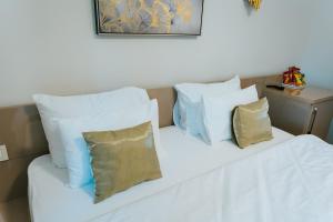 Rúm í herbergi á HOTEL Villa Cvijanović - WELLNESS-SPA