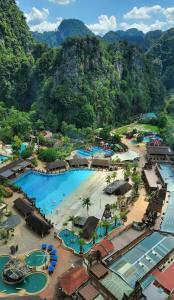 an aerial view of a resort with mountains in the background at Hotspring 1203 Studio Suite @ Sunway Onsen (4pax) in Tambun