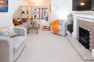 Χώρος καθιστικού στο Charming family house in High Wycombe