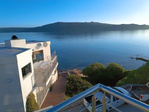 an aerial view of a house on the water at Sunset Villa in Langebaan