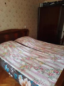 Postel nebo postele na pokoji v ubytování hotel in chiatura