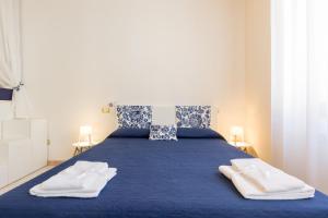 Postel nebo postele na pokoji v ubytování B&B King