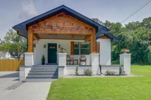 a small house with a wooden roof at Dog-Friendly Jackson Home Near Downtown Hub! in Jackson