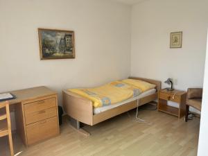 Rooms Haltenegg客房内的一张或多张床位