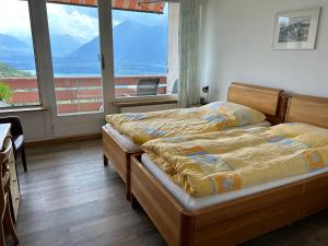 Rooms Haltenegg客房内的一张或多张床位