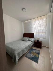 Krevet ili kreveti u jedinici u okviru objekta Apartamento en Barranquilla