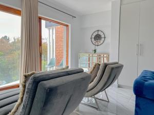 Amoris Guesthouse - In Randburg的休息区