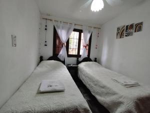 Una cama o camas en una habitación de Golden Apart Jujuy