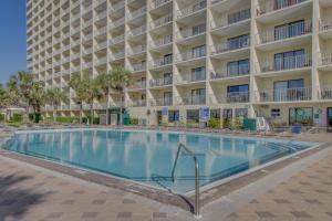 a large swimming pool in front of a hotel at Summit 723 in Panama City Beach