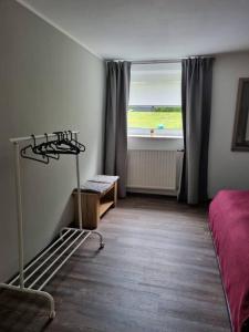 Postel nebo postele na pokoji v ubytování Gemütliche Oase - Geräumige Unterkunft