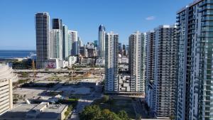 an aerial view of a city with tall buildings at Canvas Condo in Miami