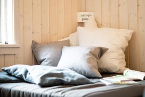 Postel nebo postele na pokoji v ubytování Resort 1 Ferienhaus Typ D 160