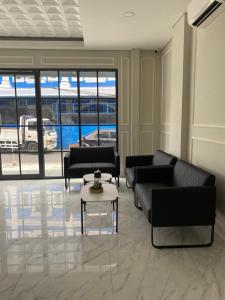 Posezení v ubytování Ghurfati Hotel Wedana