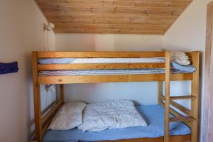 Postel nebo postele na pokoji v ubytování Femöre Marina + 10 fotografií