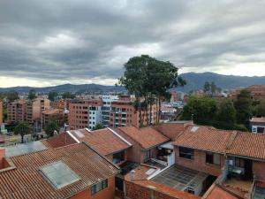 an overhead view of a city with buildings at Buena Vista in Cuenca