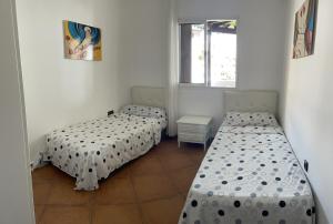 Katil atau katil-katil dalam bilik di superbe appartement en complexe avec piscine