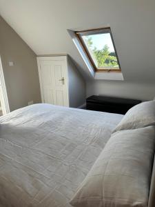 Postel nebo postele na pokoji v ubytování Drumslade Guest House