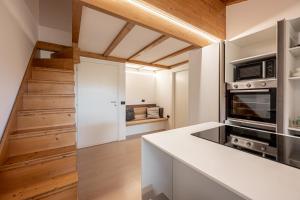 Kuchyň nebo kuchyňský kout v ubytování Agritur Deromedi