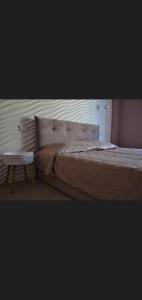 Ένα ή περισσότερα κρεβάτια σε δωμάτιο στο B&B Alice